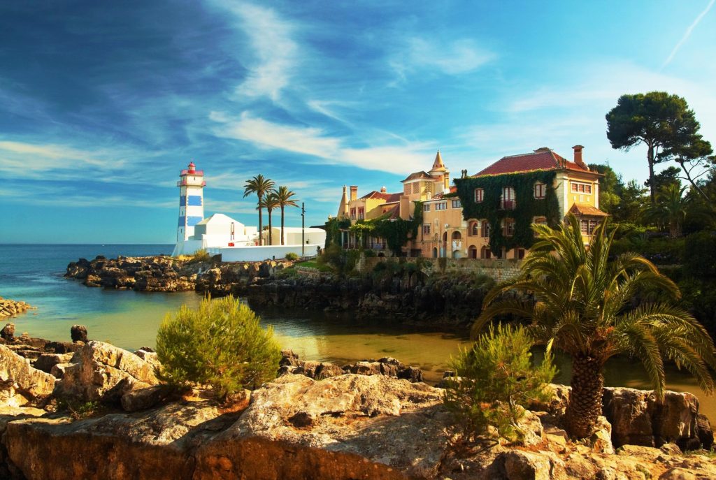 Lovely tiled lighthouse in Cascais with historical residences - best places to visit in Portugal