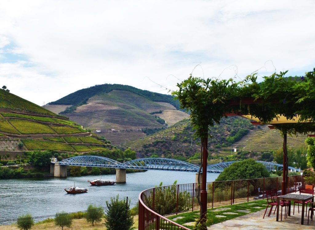 Scenic boat trip along the Douro River on board of a traditional 'rabelo' boat used to transport wine barrels