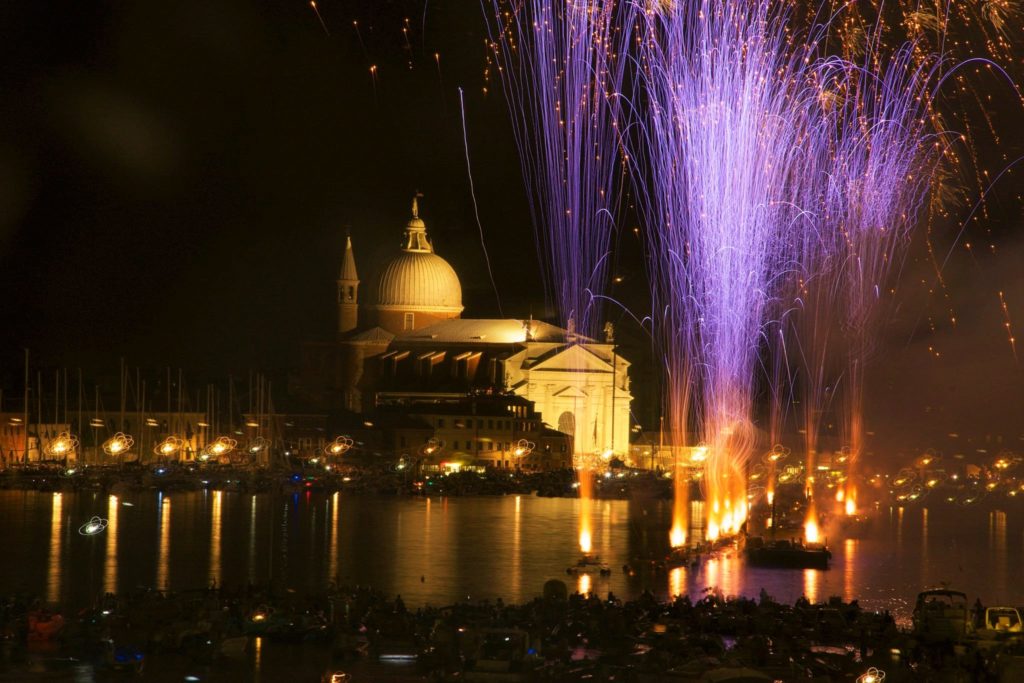 Beautiful fireworks display over the canal of Venice, Italy