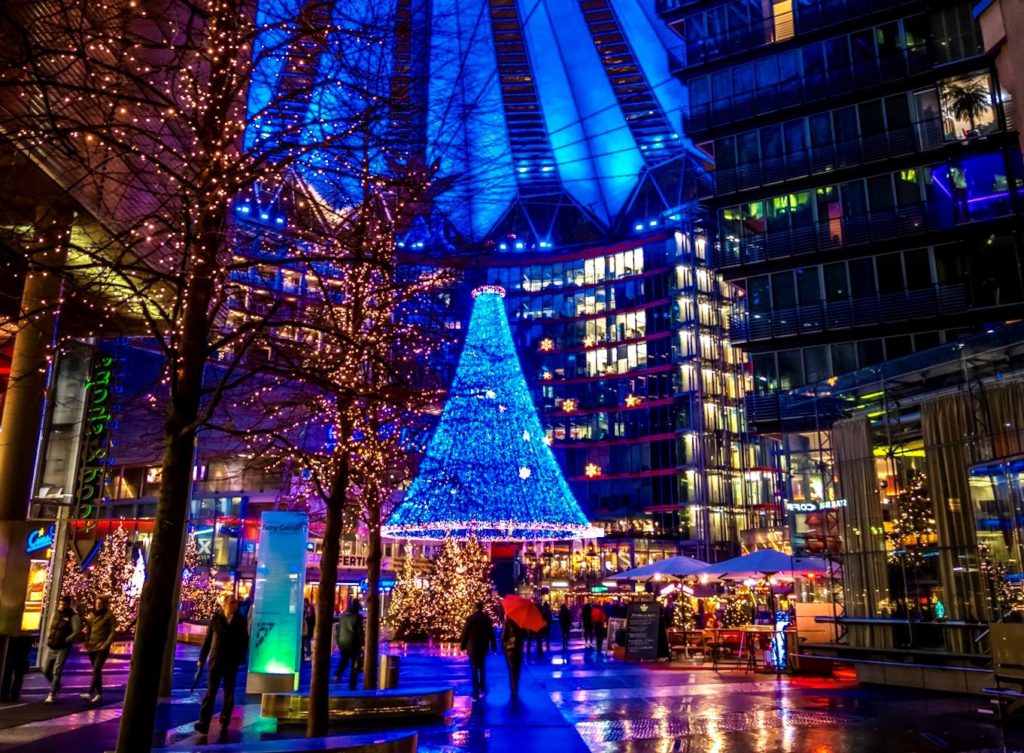Christmas market in the vivid lights of the Sony Centre in Potsdamer Platz in Berlin, Germany