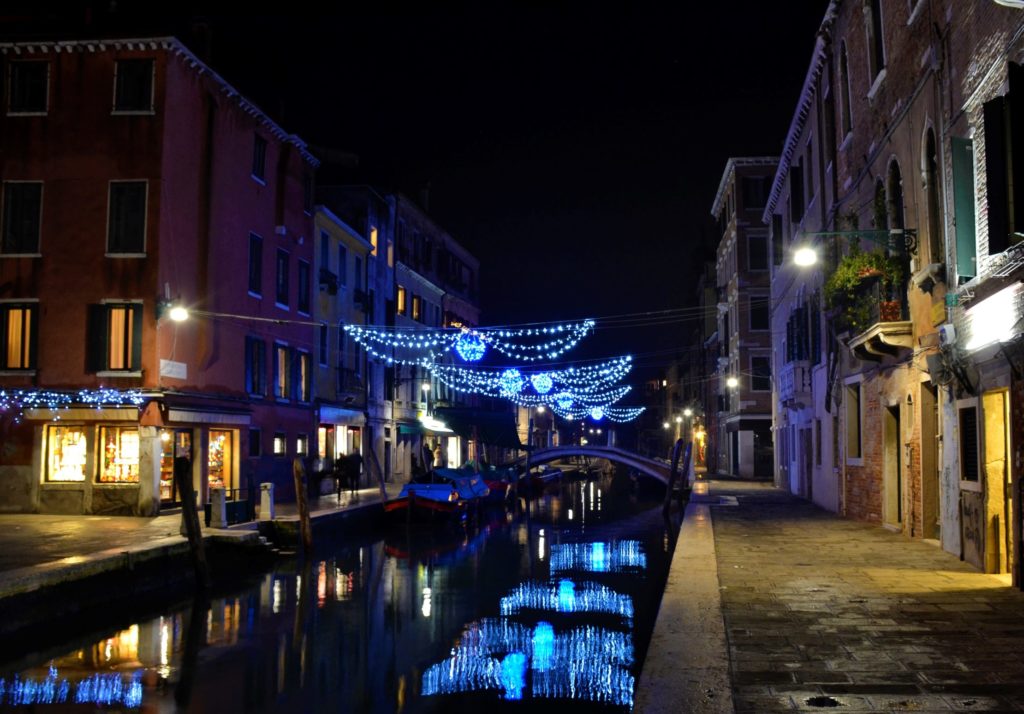 Venetian canals illuminated by Christmas lights
