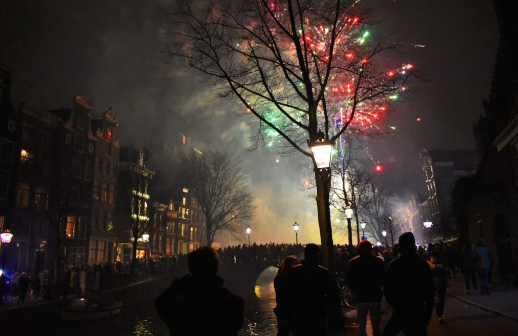 Explosive New Year's Eve over the canals of Amsterdam the Netherlands