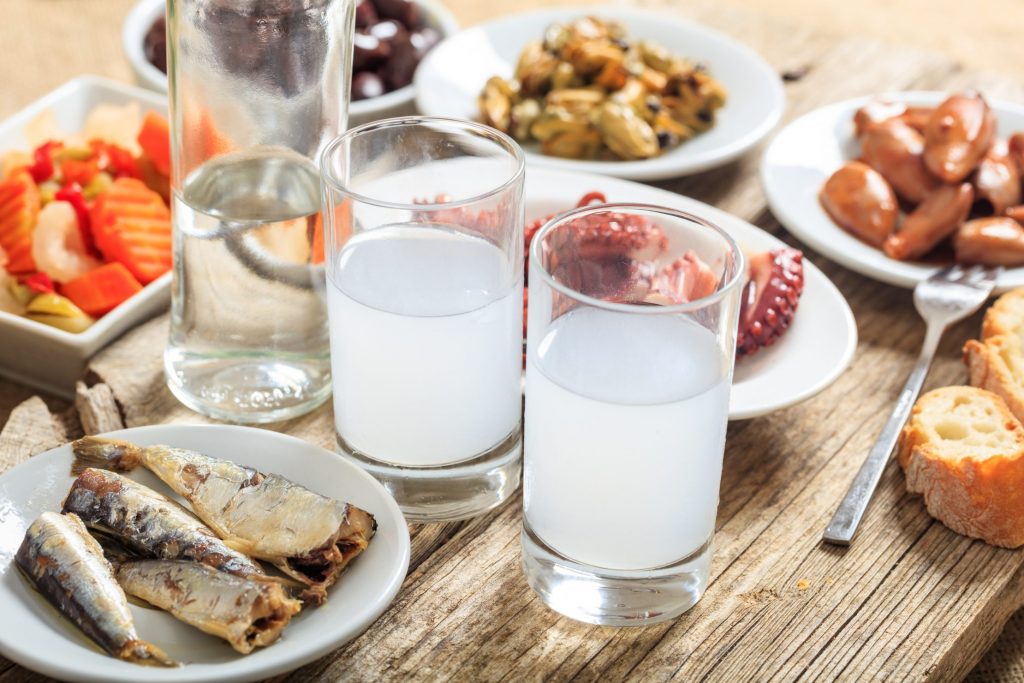 Ouzo with typical Greek appetizers