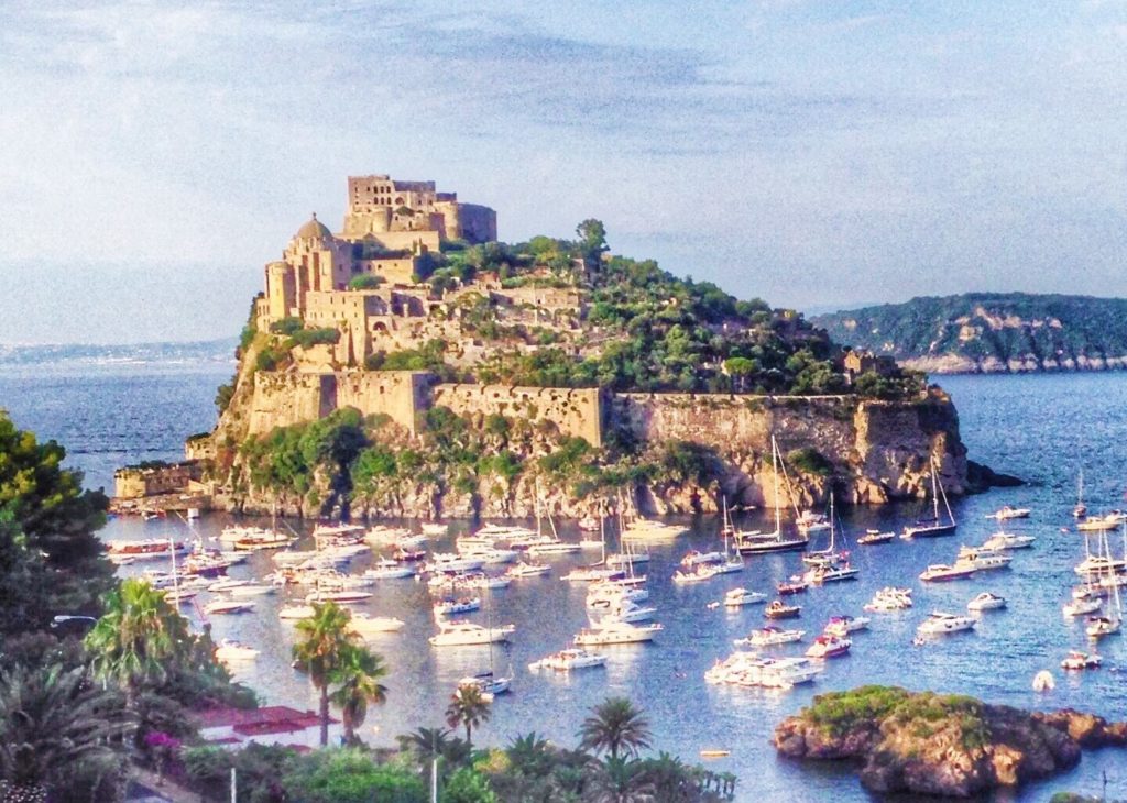 The medieval Aragonese castle emerging from the rock in Ischia, nearby Naples